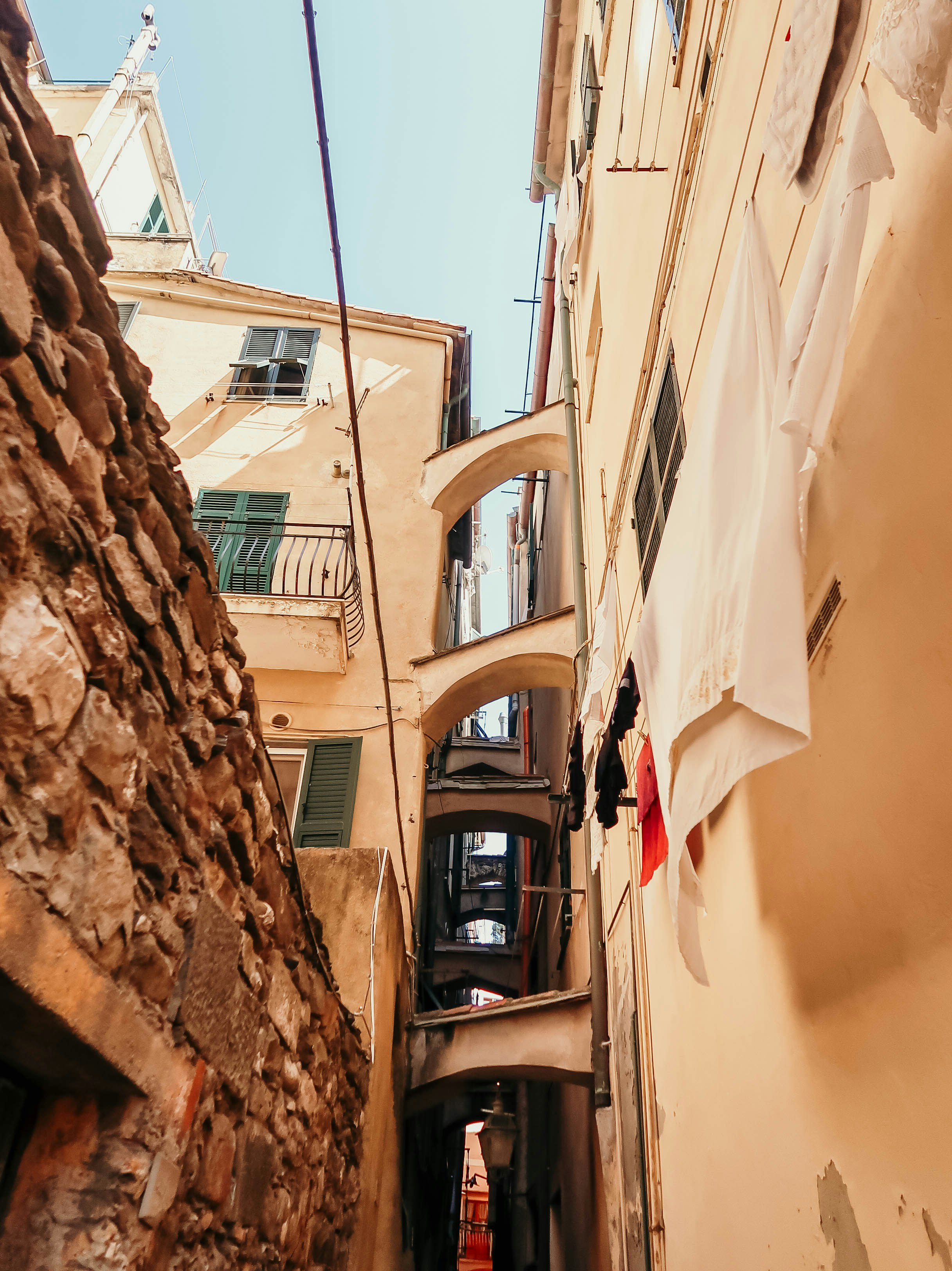 low-angle photography of beige building